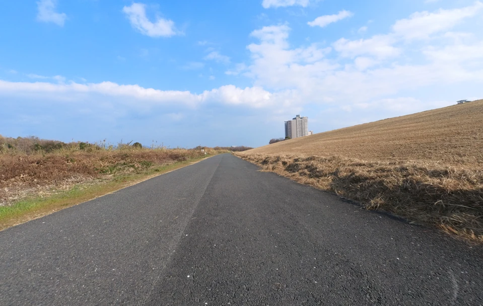 wide road under the bank