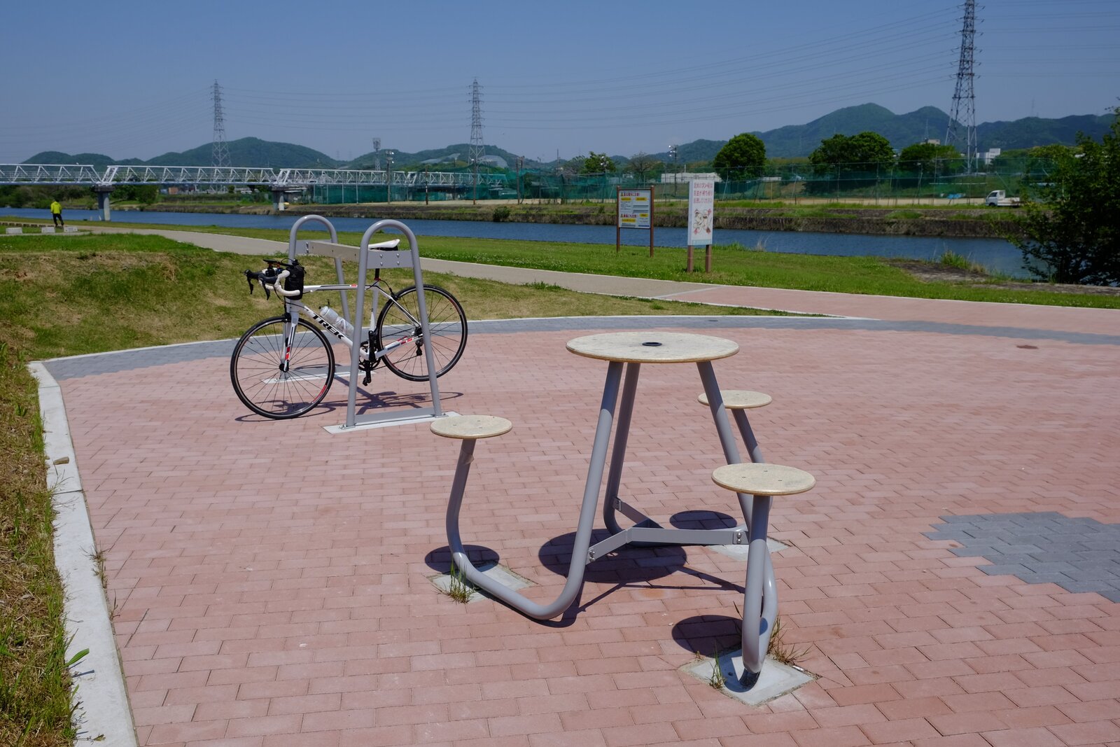 Plaza with cycle stand and tables